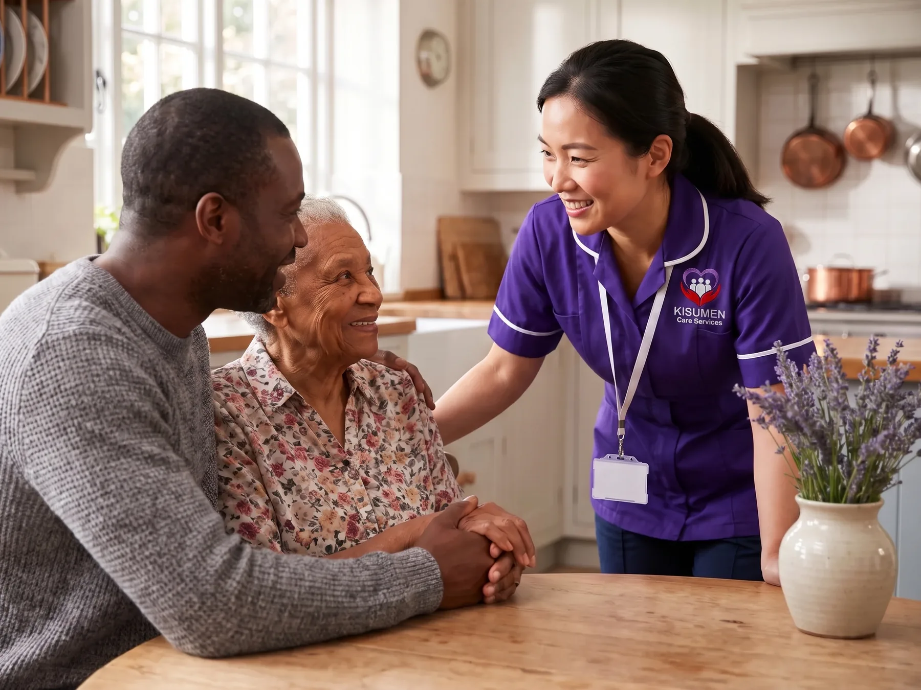Son and his elderly mother planning home care together with a Kisumen carer at the kitchen table